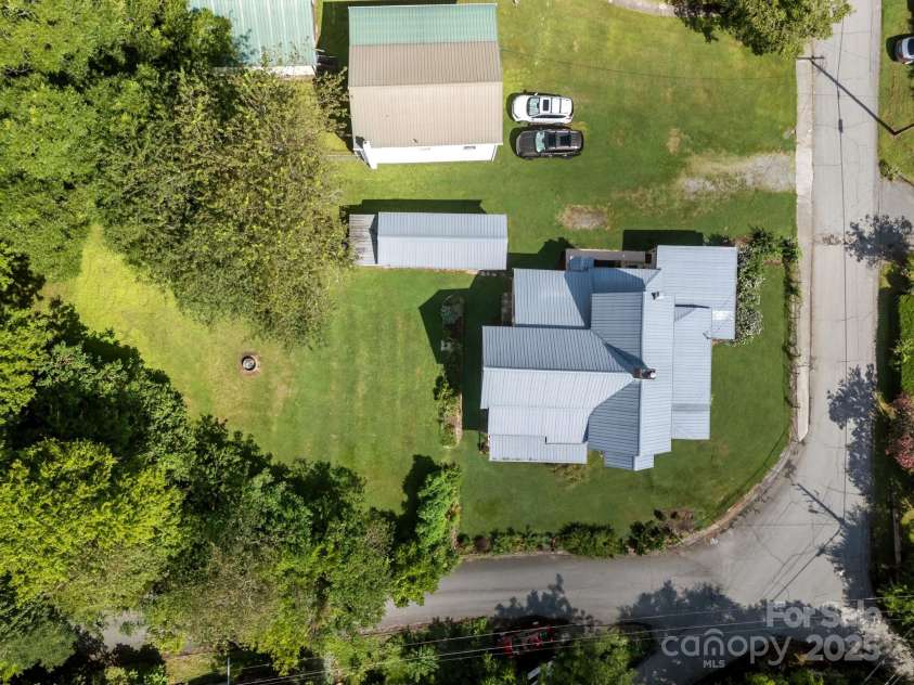 133 Lawson Street, Hot Springs, NC 28743.  MLS# CAR4277872, YatesRealty ID 26044. View of house with carriage garage