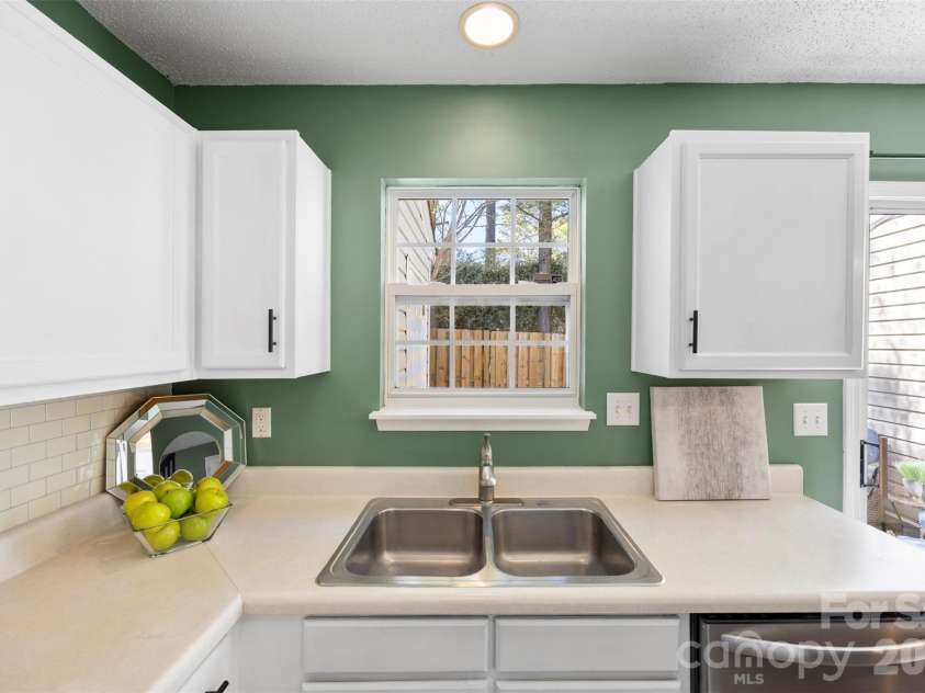 6483 Saint Bernard Way, Charlotte, NC 28269.  MLS# CAR4364168, YatesRealty ID 26049. Updated cabinets.