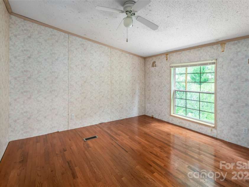 25 Elkins Branch Road, Weaverville, NC 28787.  MLS# CAR4278716, YatesRealty ID 26063. 