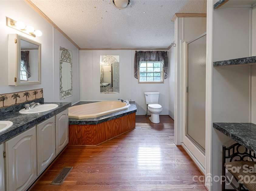 25 Elkins Branch Road, Weaverville, NC 28787.  MLS# CAR4278716, YatesRealty ID 26063. 