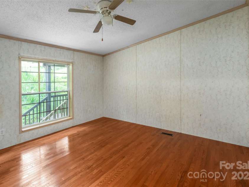 25 Elkins Branch Road, Weaverville, NC 28787.  MLS# CAR4278716, YatesRealty ID 26063. 