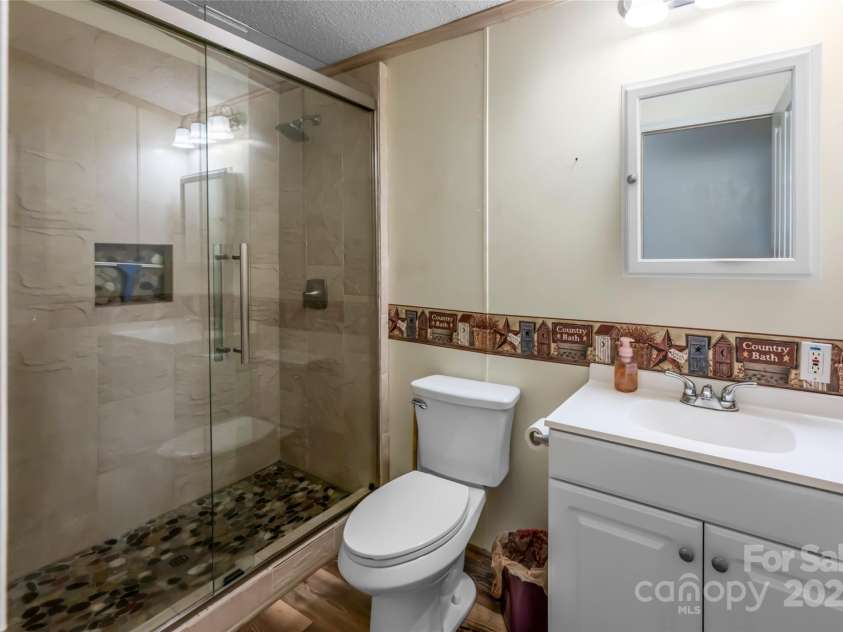 25 Elkins Branch Road, Weaverville, NC 28787.  MLS# CAR4278716, YatesRealty ID 26063. 