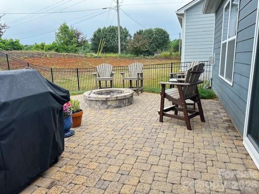 4450 Streamside Road, Denver, NC 28037.  MLS# CAR4374294, YatesRealty ID 26063. Relax all yearlong by the firepit