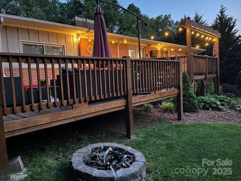 47 Fairlane Drive, Waynesville, NC 28786.  MLS# CAR4267951, YatesRealty ID 26065. Imagine yourself relaxing on this inviting deck