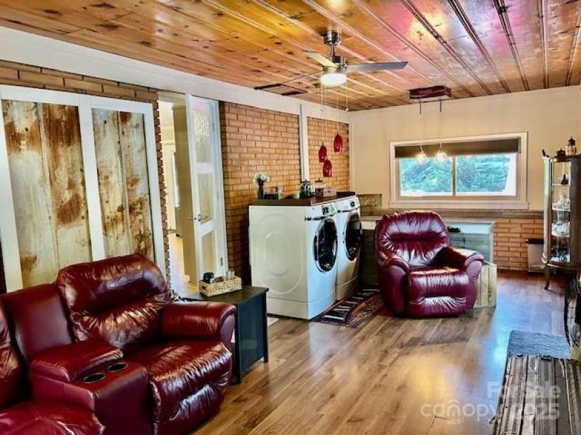 47 Fairlane Drive, Waynesville, NC 28786.  MLS# CAR4267951, YatesRealty ID 26065. Laundry Area In Den