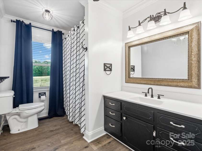 1238 Carl Allen Road, Edgemoor, SC 29712.  MLS# CAR4267482, YatesRealty ID 26066. Downstairs bathroom