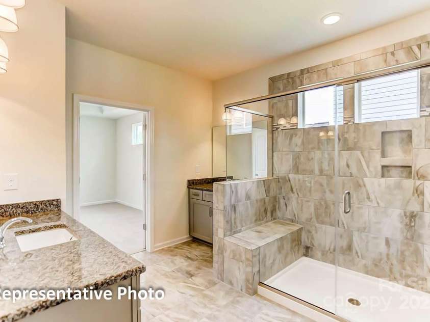 3025 Cedar Falls Drive, Waxhaw, NC 28173.  MLS# CAR4276952, YatesRealty ID 26069. Luxury Primary Shower