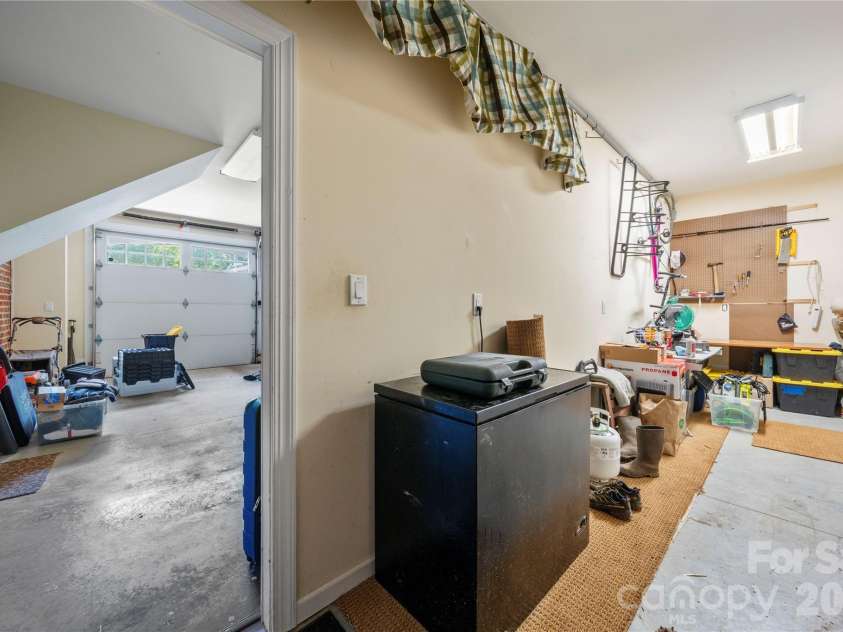 270 Sunset Drive, Concord, NC 28025.  MLS# CAR4382576, YatesRealty ID 26070. Garage storage space