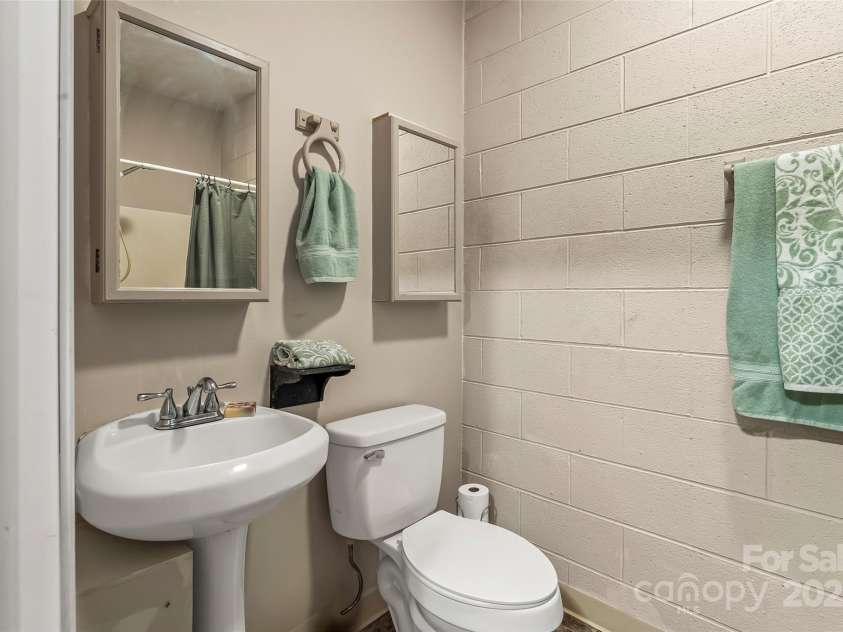 178 Herron Cove Road, Weaverville, NC 28787.  MLS# CAR4257698, YatesRealty ID 26072. Downstairs bath