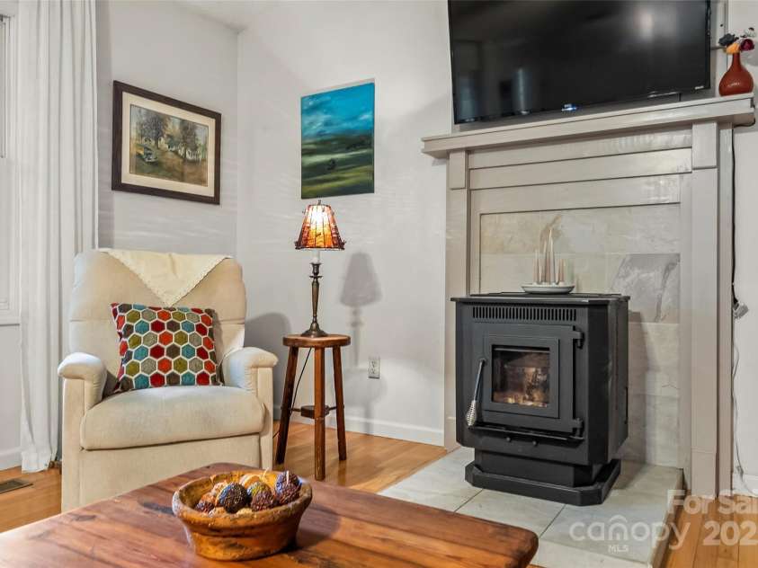 178 Herron Cove Road, Weaverville, NC 28787.  MLS# CAR4257698, YatesRealty ID 26072. Pellet stove