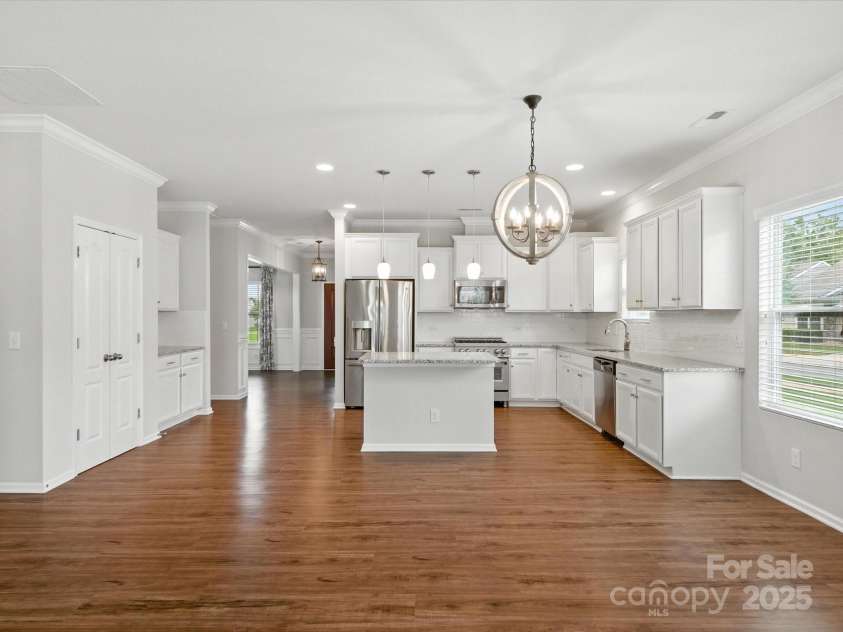 1628 Spring Blossom Trail, Fort Mill, SC 29708.  MLS# CAR4292124, YatesRealty ID 2608. Great Room, Breakfast Room and Kitchen