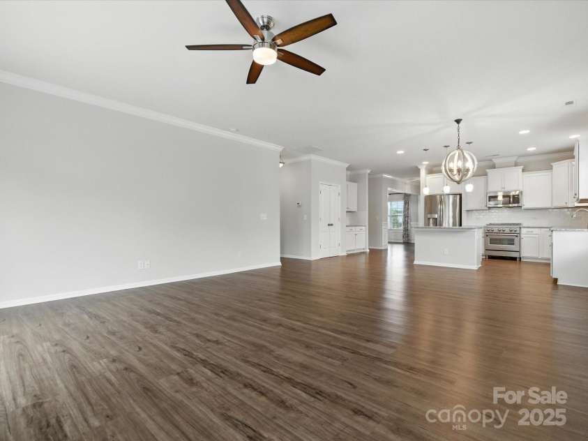 1628 Spring Blossom Trail, Fort Mill, SC 29708.  MLS# CAR4292124, YatesRealty ID 2608. Great Room, Breakfast Room & Kitchen