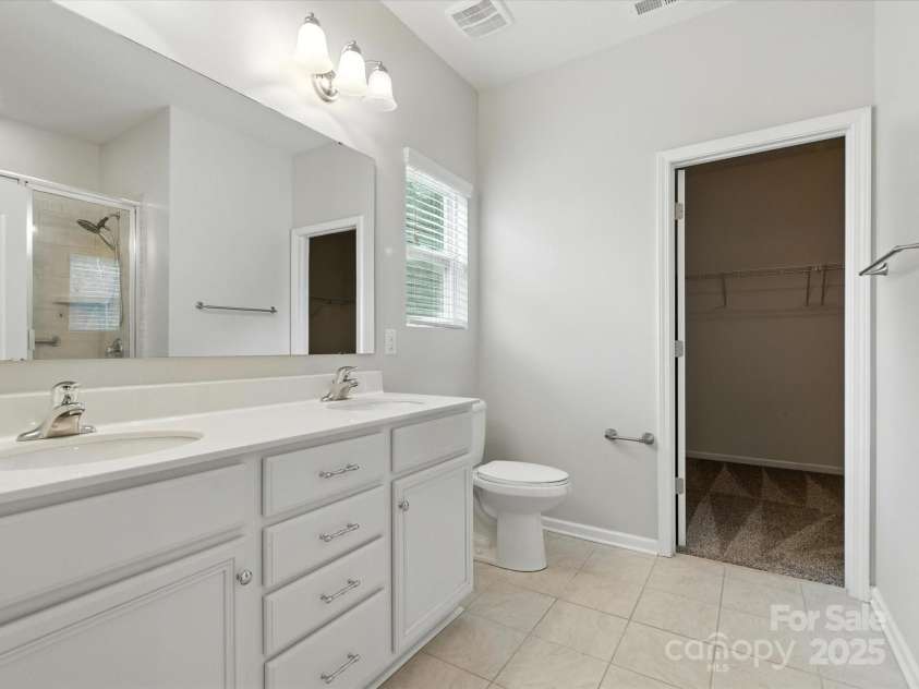 1628 Spring Blossom Trail, Fort Mill, SC 29708.  MLS# CAR4292124, YatesRealty ID 2608. Primary Bath & Walk In Closet