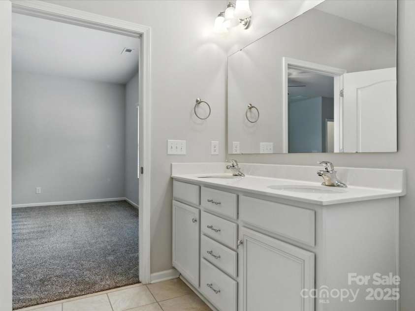 1628 Spring Blossom Trail, Fort Mill, SC 29708.  MLS# CAR4292124, YatesRealty ID 2608. Primary Bath With Dual Vanity