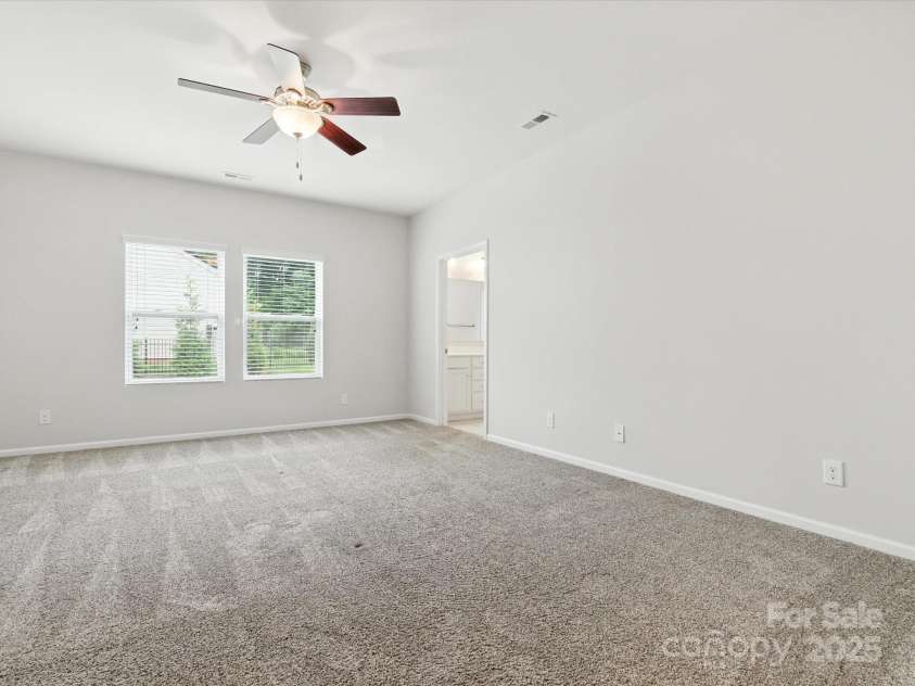 1628 Spring Blossom Trail, Fort Mill, SC 29708.  MLS# CAR4292124, YatesRealty ID 2608. Primary Bedroom