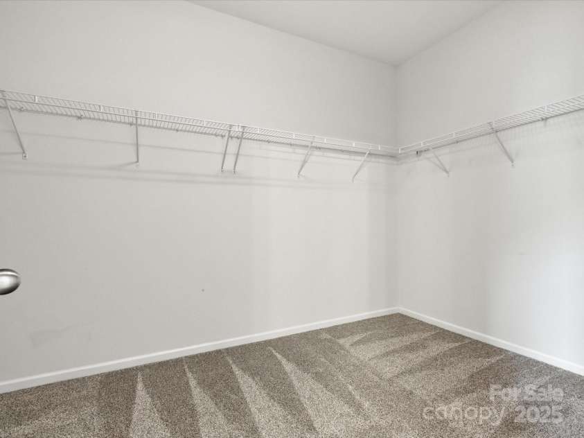 1628 Spring Blossom Trail, Fort Mill, SC 29708.  MLS# CAR4292124, YatesRealty ID 2608. Primary Walk In Closet