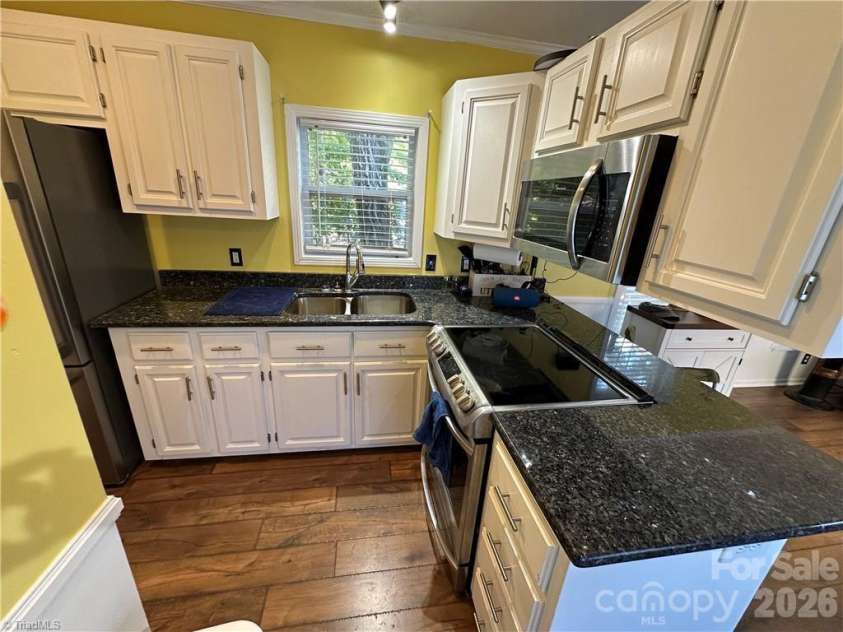 112 Cardinal Drive, New London, NC 28127.  MLS# CAR4383252, YatesRealty ID 26085. 