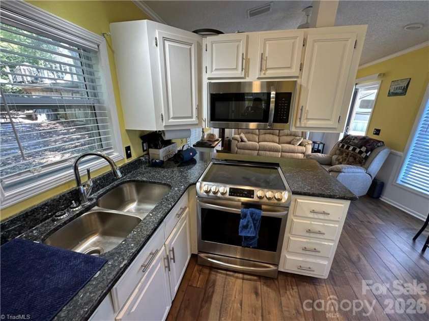 112 Cardinal Drive, New London, NC 28127.  MLS# CAR4383252, YatesRealty ID 26085. 