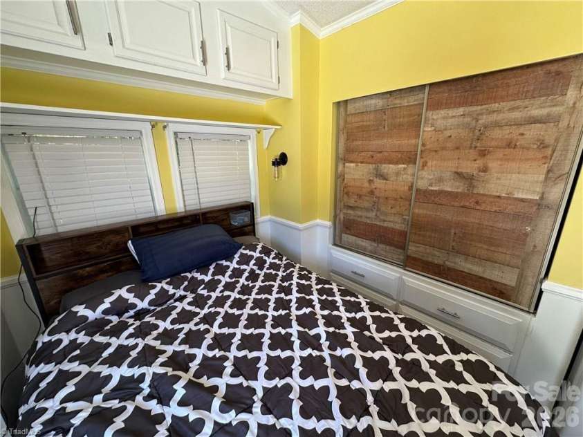 112 Cardinal Drive, New London, NC 28127.  MLS# CAR4383252, YatesRealty ID 26085. 