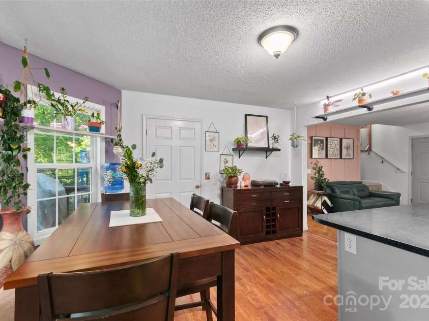 28 Grove Garden Avenue, Candler, NC 28715.  MLS# CAR4278254, YatesRealty ID 26090. Dining area