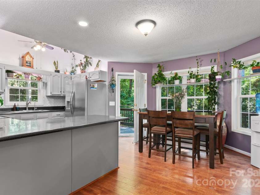 28 Grove Garden Avenue, Candler, NC 28715.  MLS# CAR4278254, YatesRealty ID 26090. Dining area and kitchen