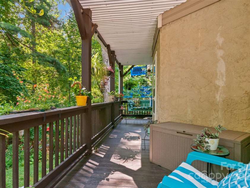 28 Grove Garden Avenue, Candler, NC 28715.  MLS# CAR4278254, YatesRealty ID 26090. Downstairs deck