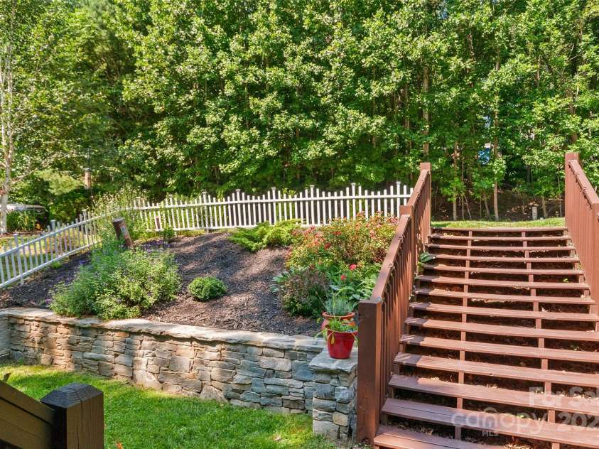 28 Grove Garden Avenue, Candler, NC 28715.  MLS# CAR4278254, YatesRealty ID 26090. Front landscaping - steps to Grove Garden Avenue