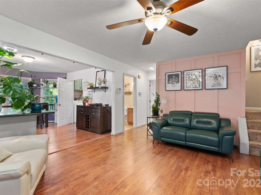 28 Grove Garden Avenue, Candler, NC 28715.  MLS# CAR4278254, YatesRealty ID 26090. Living into Dining