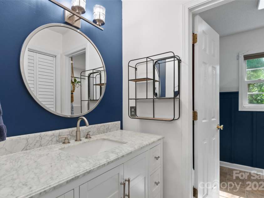 28 Grove Garden Avenue, Candler, NC 28715.  MLS# CAR4278254, YatesRealty ID 26090. Primary bath ensuite