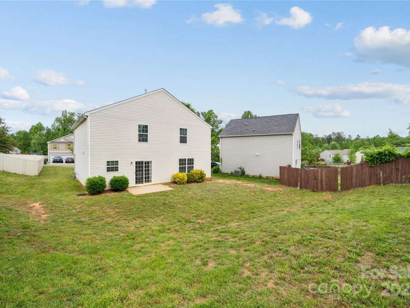 3512 Gibbon Terrace Court, Charlotte, NC 28269.  MLS# CAR4261541, YatesRealty ID 26093. Great privacy in the backyard