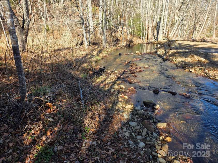 536 Hickory Springs Road, Burnsville, NC 28714.  MLS# CAR4327373, YatesRealty ID 26095. Bold creek