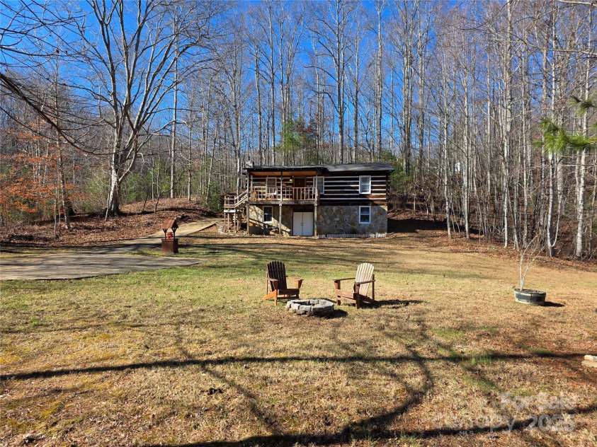 536 Hickory Springs Road, Burnsville, NC 28714.  MLS# CAR4327373, YatesRealty ID 26095. Front of home with large front yard