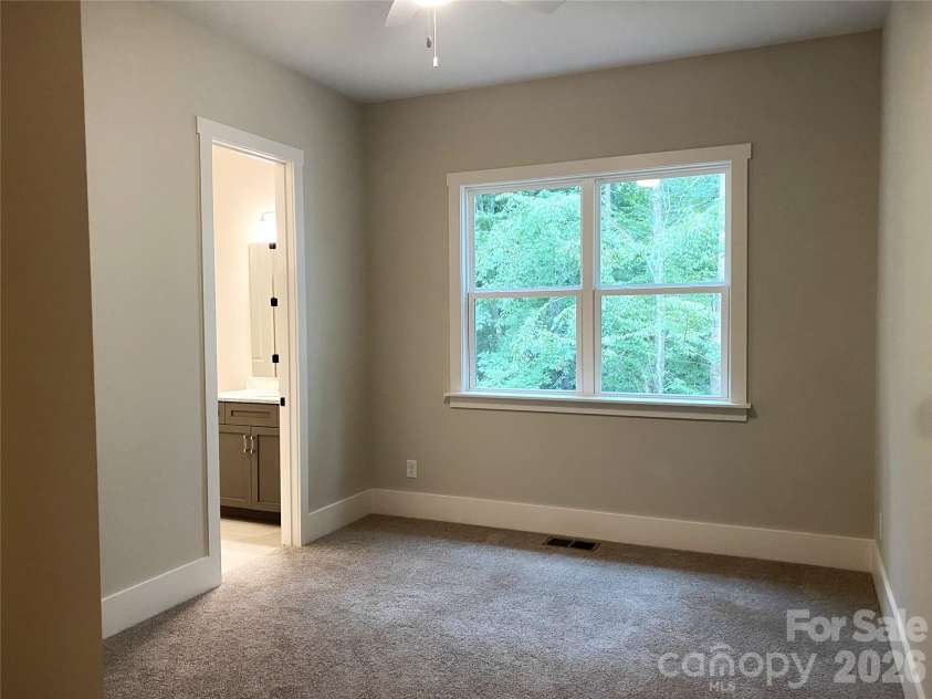 179 Chaska Loop, Troutman, NC 28166.  MLS# CAR4386501, YatesRealty ID 26098. Guest Suite on Main Level