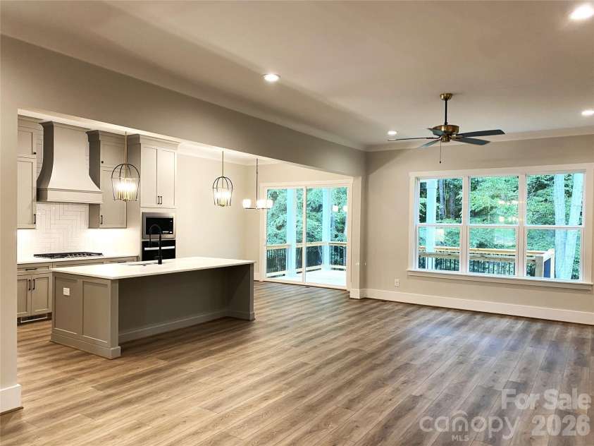 179 Chaska Loop, Troutman, NC 28166.  MLS# CAR4386501, YatesRealty ID 26098. Kitchen- Great Room