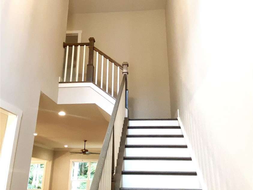 179 Chaska Loop, Troutman, NC 28166.  MLS# CAR4386501, YatesRealty ID 26098. Stairway