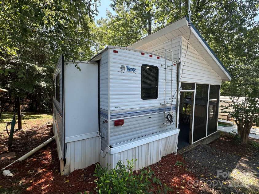 111 Deerfield Drive, New London, NC 28127.  MLS# CAR4276540, YatesRealty ID 261. 