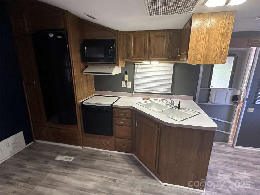 111 Deerfield Drive, New London, NC 28127.  MLS# CAR4276540, YatesRealty ID 261. 