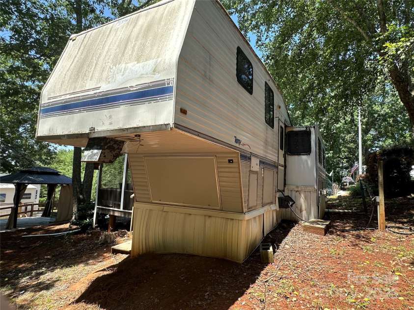 111 Deerfield Drive, New London, NC 28127.  MLS# CAR4276540, YatesRealty ID 261. 