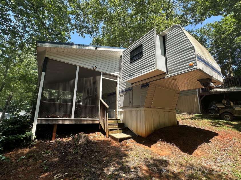 111 Deerfield Drive, New London, NC 28127.  MLS# CAR4276540, YatesRealty ID 261. 