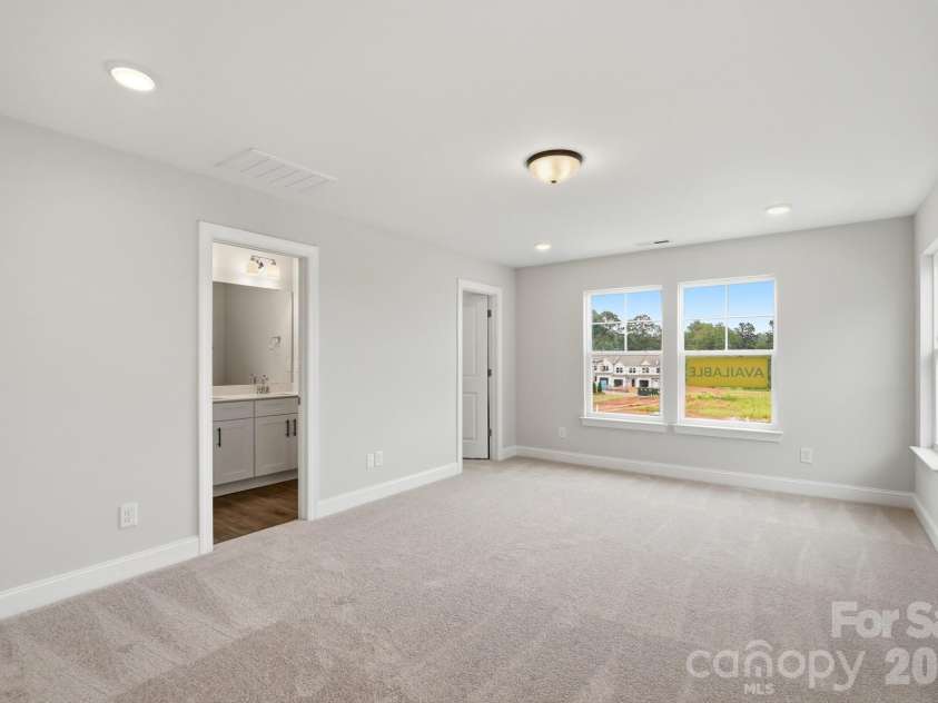 114 Pointer Trail, Troutman, NC 28166.  MLS# CAR4387480, YatesRealty ID 26103. Primary Bedroom