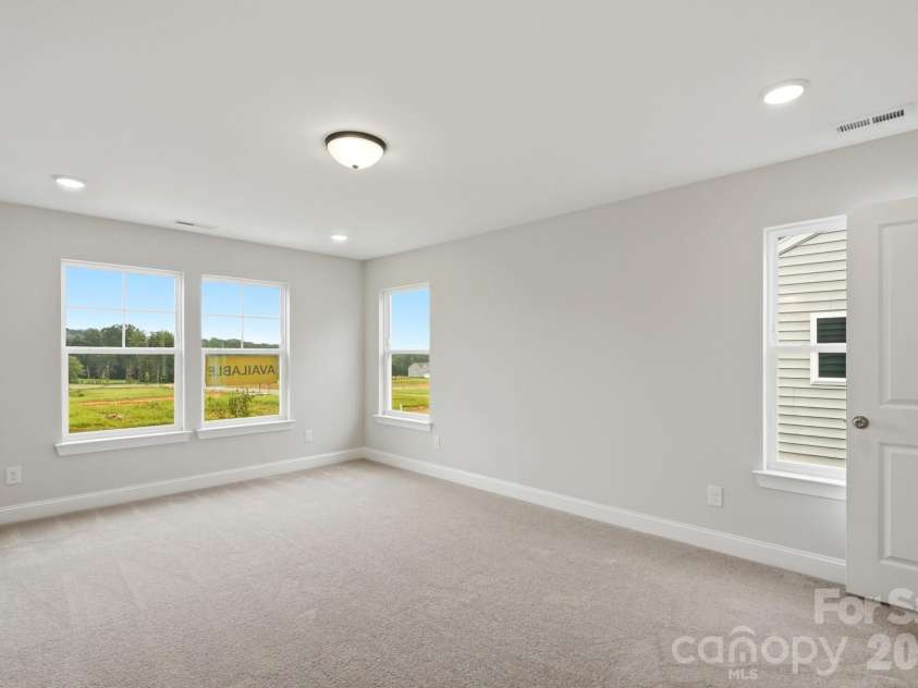 114 Pointer Trail, Troutman, NC 28166.  MLS# CAR4387480, YatesRealty ID 26103. Primary Bedroom