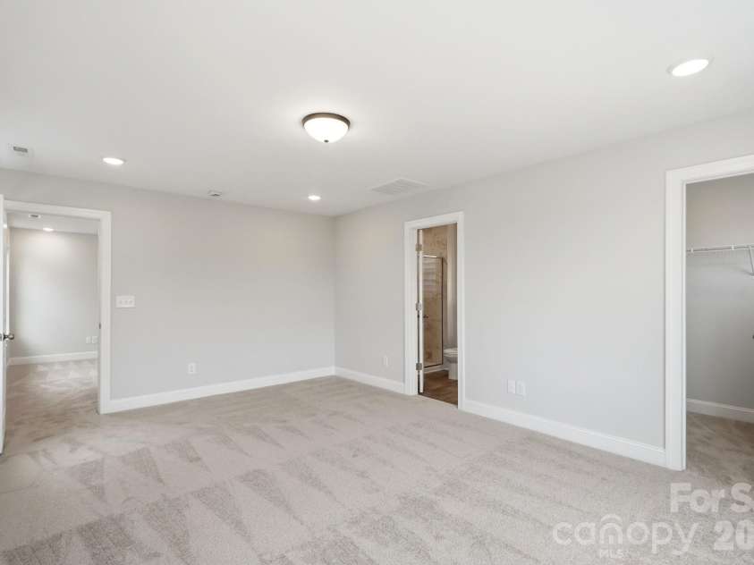 114 Pointer Trail, Troutman, NC 28166.  MLS# CAR4387480, YatesRealty ID 26103. Primary Bedroom