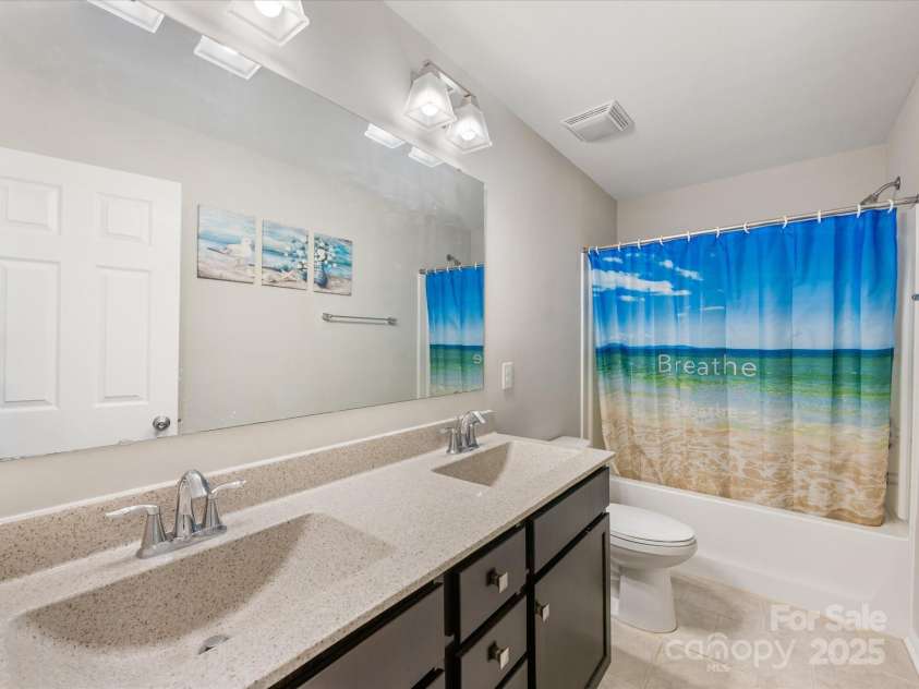 4014 Stockbrook Drive, Charlotte, NC 28215.  MLS# CAR4272265, YatesRealty ID 26105. Guest Bathroom