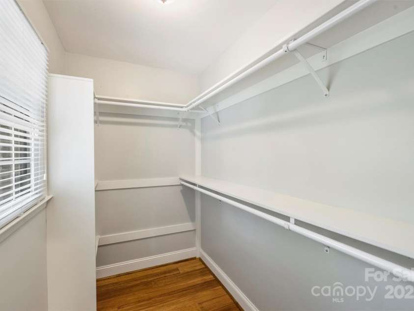 1522 Barberry Court, Charlotte, NC 28211.  MLS# CAR4258498, YatesRealty ID 2611. 1 of 2 primary walk-in closets (This one is located off the private hallway leading to the primary bedroom).