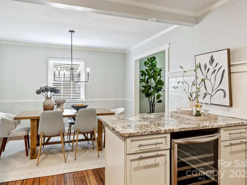 1522 Barberry Court, Charlotte, NC 28211.  MLS# CAR4258498, YatesRealty ID 2611. Kitchen features peninsula with beverage cooler - perfect for entertaining!