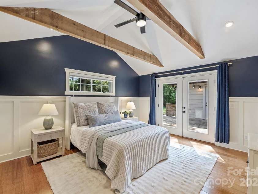 1522 Barberry Court, Charlotte, NC 28211.  MLS# CAR4258498, YatesRealty ID 2611. Primary bedroom features french doors leading onto the adorable deck.