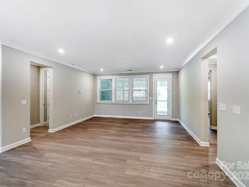 9662 Liberty Hill Drive, Mint Hill, NC 28227.  MLS# CAR4270755, YatesRealty ID 26115. Gathering Room with View of Screened Porch-Photo similar to Subject Property