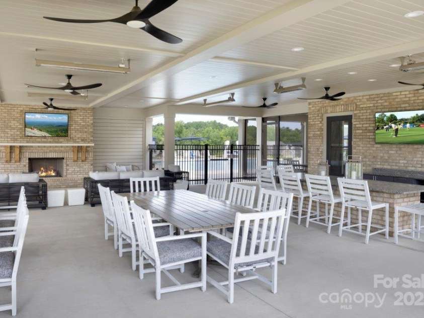 9662 Liberty Hill Drive, Mint Hill, NC 28227.  MLS# CAR4270755, YatesRealty ID 26115. Outside Covered Porch with Fireplace and Catering Kitchen
