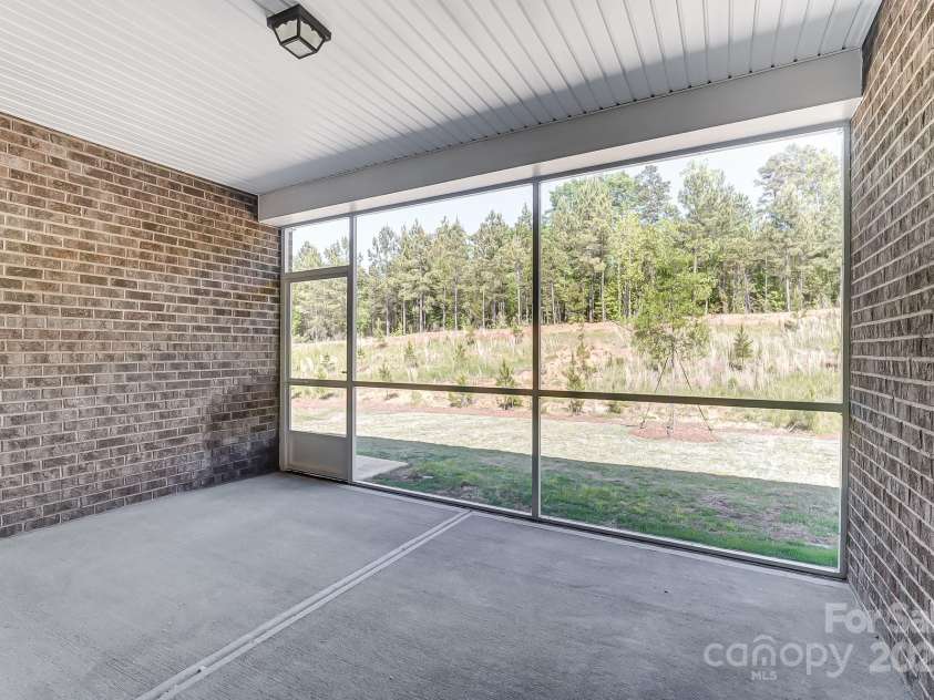 9662 Liberty Hill Drive, Mint Hill, NC 28227.  MLS# CAR4270755, YatesRealty ID 26115. Screened Porch view from Gathering Room-Photo similar to Subject Property