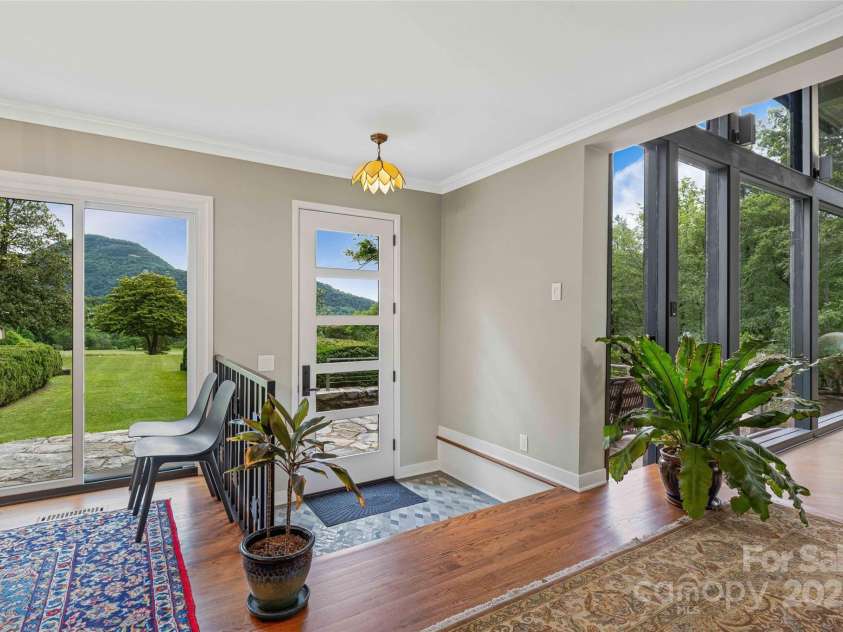 400 Kings Drive, Lake Lure, NC 28746.  MLS# CAR4264882, YatesRealty ID 2612. Modern Estate classic elements have all been updated and highlighted to take in the outdoors from every space.